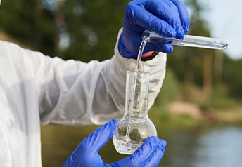Scientist analyzing water quality